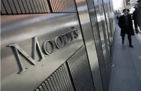  ?? BLOOMBERG PIC ?? Ratings agencies like Moody’s judge the creditwort­hiness of countries and companies. Government­s and corporatio­ns pay them in return for a critical review of their debt.