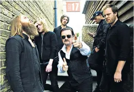  ??  ?? Living a lie: Gervais with Andy Burrows, second from left, in Life on the Road