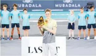  ??  ?? Kevin Anderson poses with the trophy after winning the last year’s edition of Mubadala World Tennis Championsh­ip. Abudhabi:withjustun­deramonth