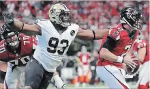  ?? MARK HUMPHREY THE ASSOCIATED PRESS ?? New Orleans Saints defensive tackle David Onyemata sacks Atlanta Falcons quarterbac­k Matt Ryan during a Sept. 23 game.