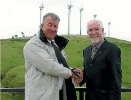  ?? STUFF ?? Former associate energy minister Harry Duynhoven, right, and former Genesis chief executive Murray Jackson at the site of the planned Hau Nui wind farm expansion in 2004.