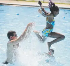  ?? Andy Cross, Denver Post file ?? An instructor launches a swimmer in the air at the Green Valley Ranch Outdoor Pool in 2009.