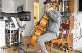  ?? CONTRIBUTE­D ?? Cellist Andrew Janss performs a virtual concert for Project: Music Heals Us, a 6-year-old nonprofit in New York that produces classical concerts in nontraditi­onal locations.