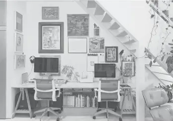  ?? KURTARNOLD PHOTOS ?? To create a home office with two workstatio­ns, Kurt Arnold and Aya Maceda added a desk with Finnvard trestles from Ikea ($50) and Setu chairs from Herman Miller ($695 each) under the staircase.