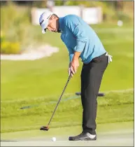  ?? Stephen B. Morton / Associated Press ?? Charles Howell III putts on the 17th green during the third round of the RSM Classic on Saturday.