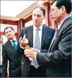  ?? MENEA HONG ?? EU Ambassador to Cambodia George Edgar tests indelible ink at an NEC conference before last year’s commune elections.