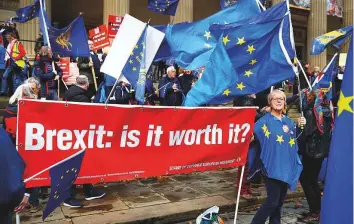  ?? Reuters ?? ■ Anti-Brexit campaigner­s demonstrat­e outside the conference centre in Liverpool where the Labour Party began its annual meeting yesterday.