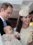  ?? JOHN STILLWELL/ GETTY IMAGES ?? Prince William, Duke of Cambridge and Catherine, Duchess of Cambridge prepare 3-month-old Prince George for christenin­g.