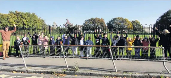  ??  ?? Pupils at Compass Point School in Bedminster celebrate the ban on dogs from South Street Park