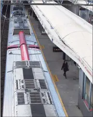  ?? Tyler Sizemore / Hearst Connecticu­t Media ?? The platform is nearly empty at the Metro-North station in Stamford on Tuesday. New Haven Line ridership is down 80 percent and service has been reduced 38 percent as the railroad awaits crucial federal aid.