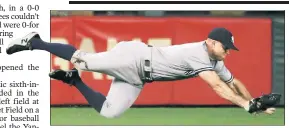 ?? AP ?? MINNY DIVER: Brett Gardner makes a diving catch during the second inning of the Yankees’ 7-2 win over the Twins.