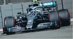  ??  ?? Big error: Valtteri Bottas (above) crashed with Romain Grosjean