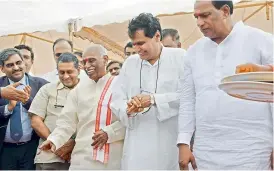  ?? —DC ?? Union minister for civil aviation, commerce and industry, Suresh Prabhu, at Begumpet Airport on Thursday. Former Union minister and MP Bandaru Dattatreya and MP Malla Reddy are also seen.