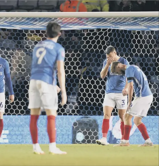  ?? Picture: Jason Brown ?? dejected after conceding a stoppage-time winner against Harrogate Town at Fratton Park on Saturday