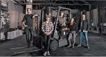  ?? JASON HENRY/THE NEW YORK TIMES ?? Pax Mahle, from left, Scott Schultz, Jaimee Motley, Martha Stoumen and Carlo Mondavi all make their own wines in Mahle’s production facility in Sebastopol, California. Here, community endures despite the pressures the pandemic brings.