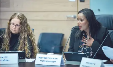  ?? (Yonatan Sindel/Flash90) ?? MK PNINA Tamano-Shata (right), chair of the Knesset Committee on the Status of Women and Gender Equality, leads a committee meeting, earlier this month.