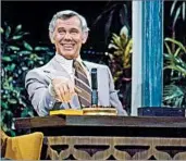  ?? NBC ?? Johnny Carson claimed on “The Tonight Show” in July 1986 that his cigarette lighter, coffee cup and cigarette box had been stolen, but he was joking.