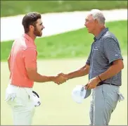  ?? Star Tribune via AP - Aaron Lavinsky ?? Twenty-year-old Matthew Wolff (left) shakes the hand of his playing partner Saturday, 60-year-old Tom Lehman.