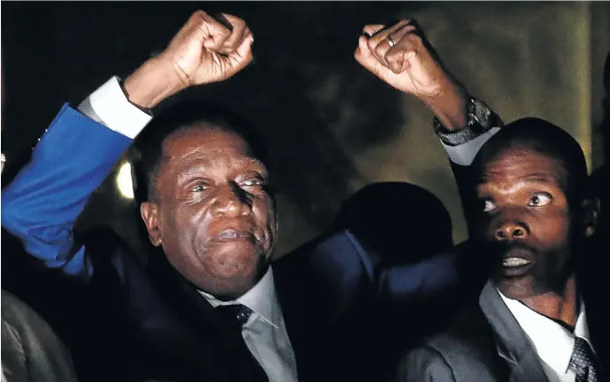  ?? Picture: Reuters ?? NARROW ESCAPE President Emmerson Mnangagwa gestures to supporters in Harare shortly after his return to Zimbabwe after fleeing for his life to SA in November last year.