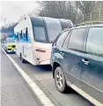  ?? ?? The BMW and caravan after being pulled over by police on the motorway