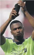  ??  ?? Daniel Sturridge hails the fans