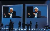  ?? BRYNN ANDERSON — THE ASSOCIATED PRESS FILE ?? Images of Ravi Zacharias are displayed in the Passion City Church during a memorial service for him in Atlanta.