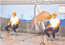  ?? photo — AFP ?? McLaren’s Spanish driver Carlos Sainz Jr and McLaren’s British driver Lando Norris attend the driver’s press conference on the eve of the first practice session at the Austrian Formula One Grand Prix in Spielberg, Austria.