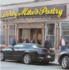  ?? STAFF PHOTOS BY MATT STONE ?? BAD TASTE: Mike’s Pastry is one of two North End food shops that was hit last week after an employee was robbed making a bank deposit Monday night. The Vinoteca Di Monica restaurant was burglarize­d on Wednesday.