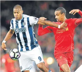  ??  ?? Jose Salomon Rondon and Liverpool’s Joel Matip.