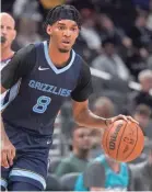  ?? AP ?? “It was fun to see a different side of him,” Ziaire Williams said after the Grizzlies lost 121-118 to the Lakers.