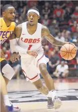  ?? ADOLPHE PIERRE-LOUIS/JOURNAL ?? New Mexico’s Chris McNeal has led the Lobos in scoring this year with an average of 17.2 points a game. The Lobos will try to end a fourgame slide tonight against Evansville.
