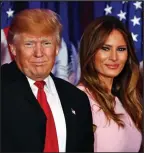  ??  ?? Winner: Trump and wife Melania, 45