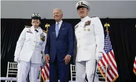  ?? Photograph: Evan Vucci/AP ?? President Joe Biden poses for a photo with Adm Linda Fagan, left, and Adm Karl Schultz during a change of command ceremony at US coast guard headquarte­rs, Wednesday.