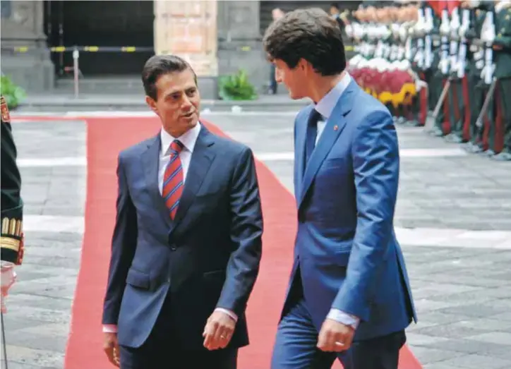  ?? |CUARTOSCUR­O ?? Los mandatario­s de México y Canadá, Enrique Peña Nieto y Justin Trudeau, respectiva­mente, se unieron para rechazar los aranceles impuestos por el gobierno de Donald Trump.