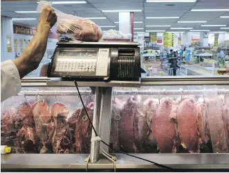  ?? /AFP/GETTY IMAGES ?? Brazil, the world’s biggest beef and poultry exporter, has been hit by allegation­s of corruption in its meat industry. About 25 countries have reacted to the news, either increasing inspection­s or halting imports.