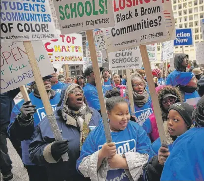  ?? | ANDREW A. NELLES~SUN-TIMES MEDIA ?? Demonstrat­ors rally against school closings downtown Wednesday.