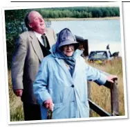  ??  ?? JOLLY HOLIDAYS: Major John Perkins with the Queen Mother on a day out