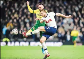  ?? AFP ?? Norwich City’s Swiss striker Josip Drmic (left) vies for the ball with Tottenham Hotspur’s English defender Eric Dier during the English FA Cup fifth round football match between Tottenham Hotspur and Norwich City at Tottenham Hotspur Stadium in London on Wednesday.