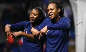  ?? Photograph: Franck Fife/AFP/Getty Images ?? France's Marie-Antoinette Katoto (right) and Kadidiatou Diani form an A with their fingers in support of Aminata Diallo.