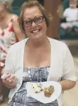  ??  ?? Andrea enjoying cake at the Weight Watchers fundraiser.