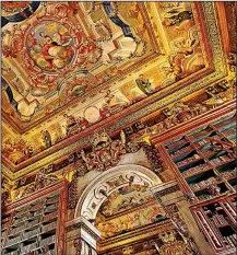  ?? Rick Steves’ Europe/DOMINIC ARIZONA BONUCCELLI ?? Coimbra University’s King Joao’s Library, in Portugal, has a spectacula­r ceiling and is one of Europe’s best surviving Baroque libraries.