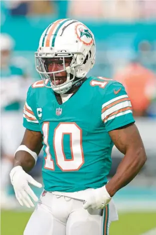  ?? JOHN MCCALL/SOUTH FLORIDA SUN SENTINEL ?? Dolphins wide receiver Tyreek Hill is seen before last Sunday’s game against the Cowboys at Hard Rock Stadium in Miami Gardens. He was not at the team’s Thursday’s practice following a fire at his house Wednesday.