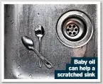 ?? ?? Baby oil can help a scratched sink
But the white UPVC door top coat wrinkled in a few places. What’s gone wrong?