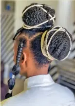  ?? ?? HAIR LANGUAGE: Bold with ornaments or hair decoration­s like beads, shells is intrinsic value in the hair business!