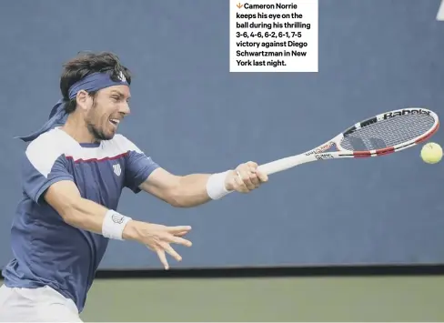  ??  ?? 1 Cameron Norrie keeps his eye on the ball during his thrilling 3-6, 4-6, 6-2, 6-1, 7-5 victory against Diego Schwartzma­n in New York last night.