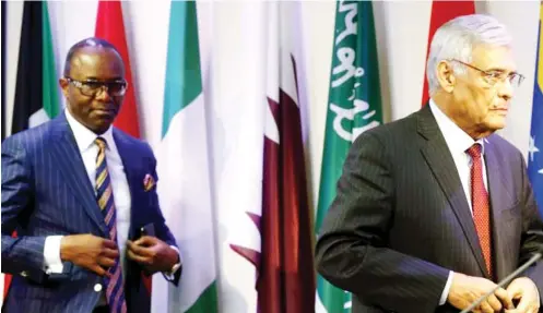  ??  ?? Nigeria's Ibe Kachikwu and OPEC Secretary Abdullah al-Badri prepare to exit an OPEC meeting, recently.