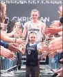  ?? Contribute­d / Team IMPACT ?? Daniela Ciriello is pictured with the 2019- 20 UConn women's basketball team.