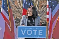  ?? AP PHOTO/BEN GRAY ?? Vice President-Elect Kamala Harris campaigns for Democratic U.S. Senate challenger­s the Rev. Raphael Warnock and Jon Ossoff on Dec. 21 in Columbus, Ga.