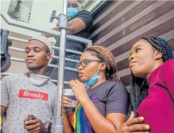  ?? Picture: DEBORAH ISAWUMI ?? MAKING WAVES: On the set of the movie, Uyaiedu Ikpe-Etim, centre, is the director of ‘Ife’, Nigeria's first film featuring a love story between two women.