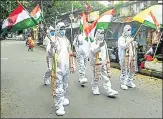  ?? AFP ?? Covid warriors in PPE gear participat­e in Independen­ce Day n celebratio­ns in Kolkata.